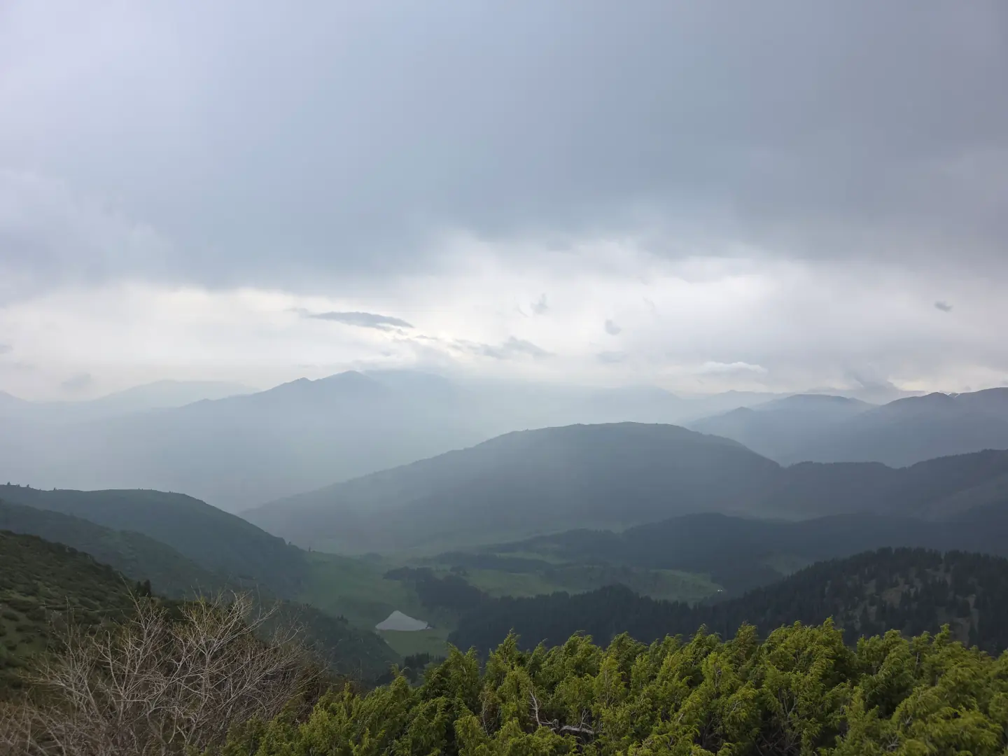 Misty mountain valleys above the Kairak route