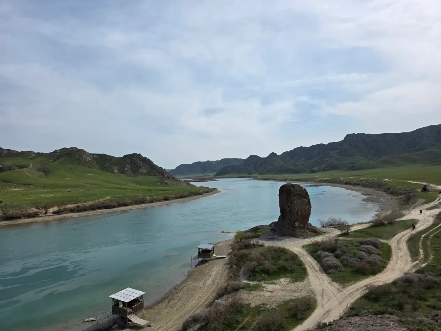 Solitary rock pillar on the bank of the Ili River