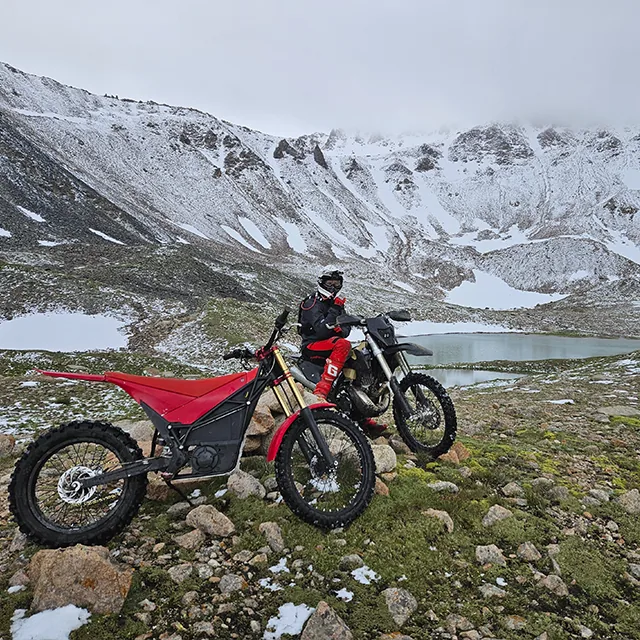 Massive boulder field below Tereshkova Peak with bikes picking through the gaps